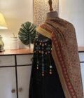 Hand Embroidered with real mirrors and Handblocked Cotton Salwars by Ikhtirah