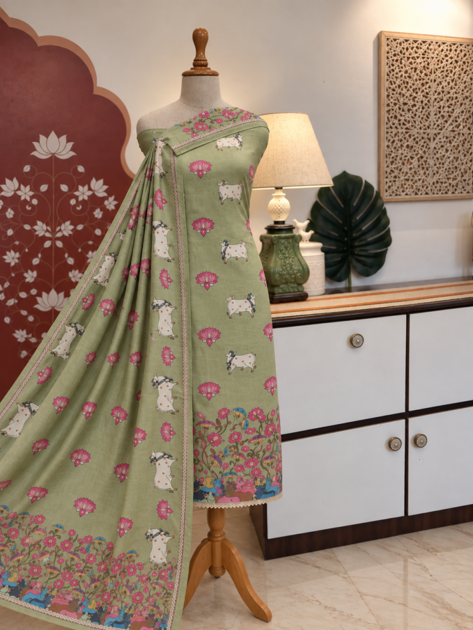 Hand Highlighted Pichwai Mul Cotton Unstitched Salwar Suit by Ikhtirah (Pastel Green)