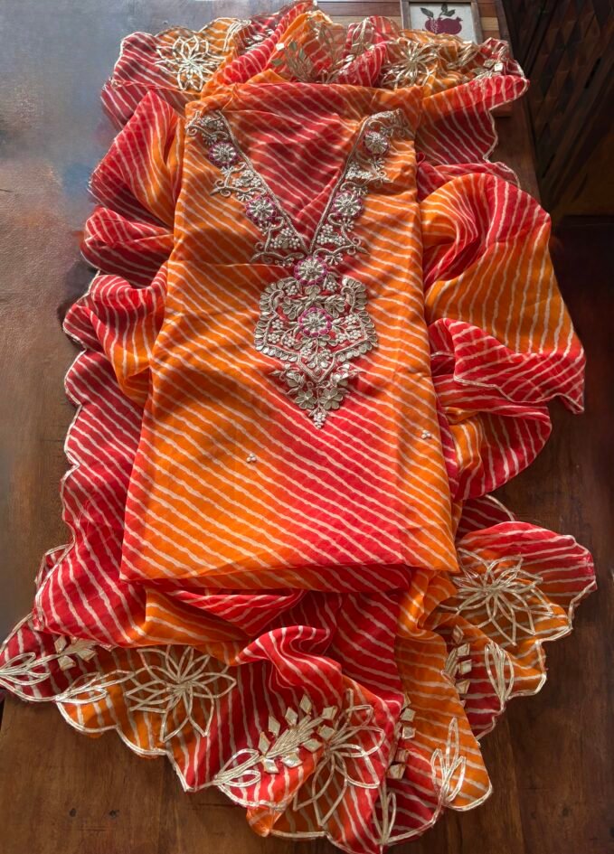 Leheriya Gorgette with Hand Embroidered Unstitched Salwar Suit (Orange)